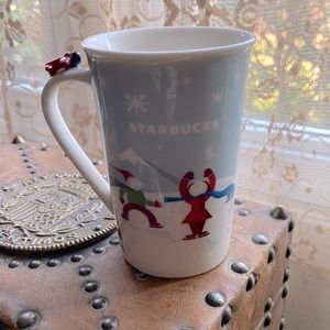 Starbucks Holiday 2011 small bone china dog sledding and people skating mug cup